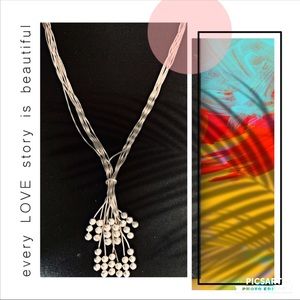 Sterling silver multi strand tussle necklace